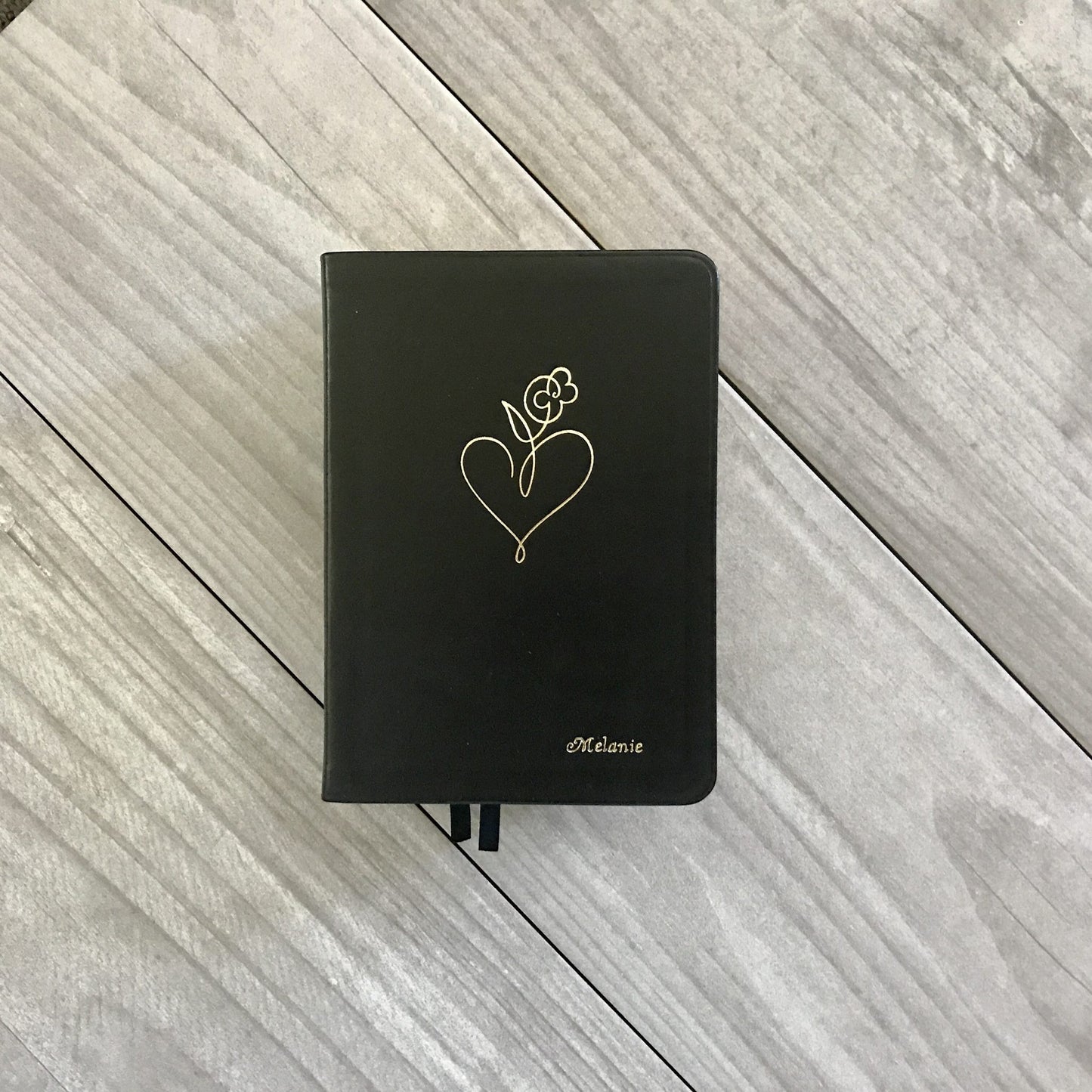 Flowering Heart Stamped on black quad LDS scriptures by Jessie Anne
